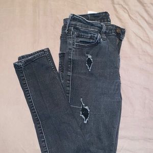 Black Hollister distressed skinny jeans